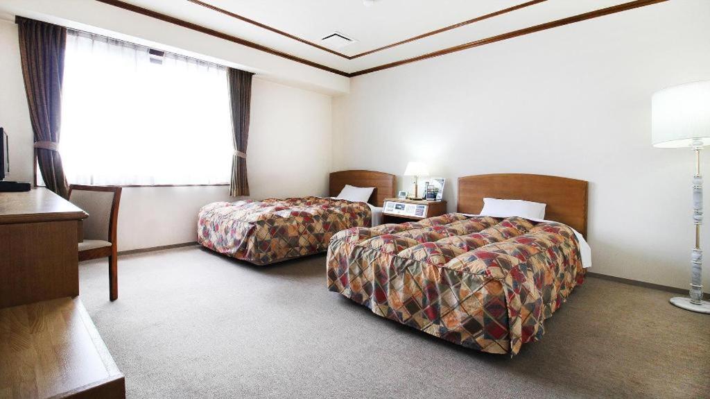 Neyagawa Trend Hotel Osaka Buitenkant foto